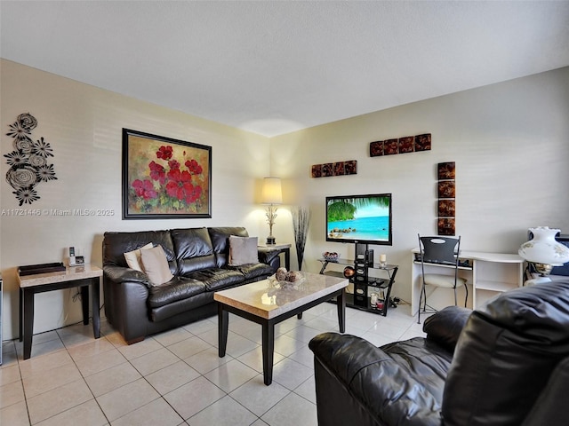 living room with light tile patterned flooring