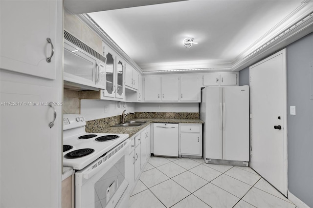 kitchen featuring white appliances, crown molding, sink, light tile patterned floors, and white cabinetry