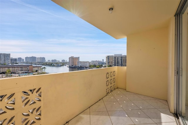 balcony featuring a water view