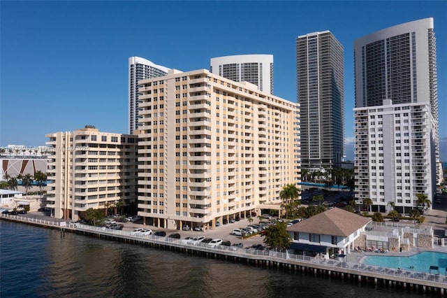 view of building exterior with a water view