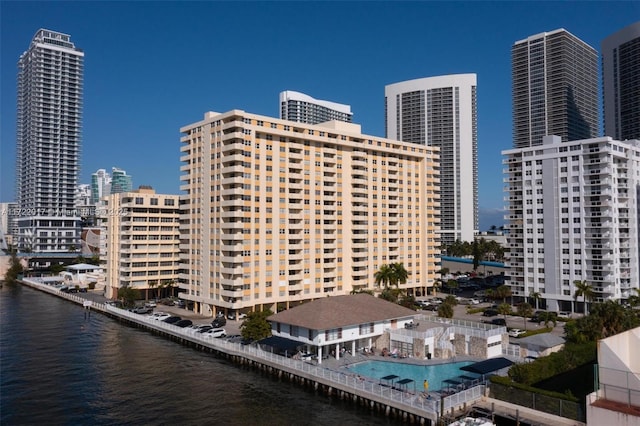 view of building exterior with a water view