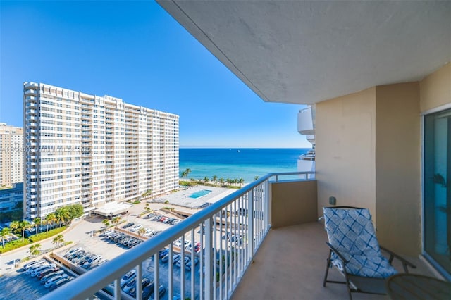 balcony featuring a water view