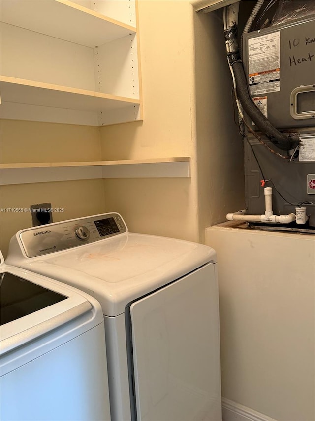 laundry room featuring washer and dryer