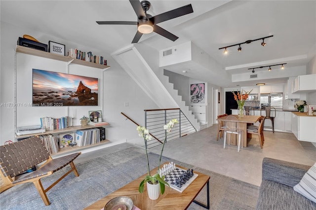 living room with ceiling fan