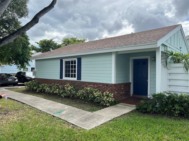 exterior space featuring a front yard