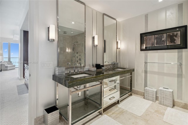 bathroom featuring vanity and a shower with shower door