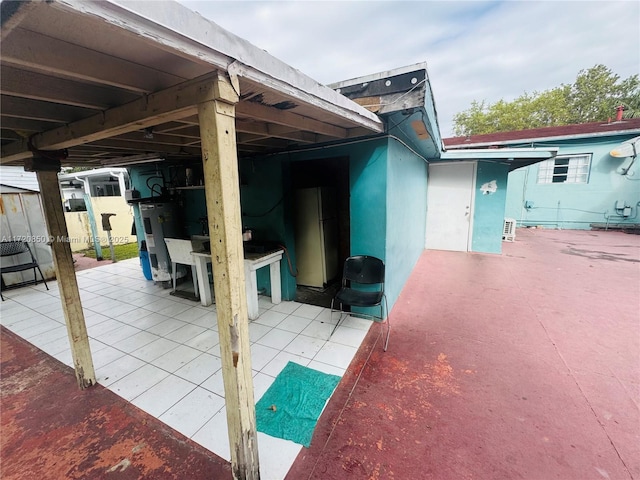 view of patio / terrace featuring water heater