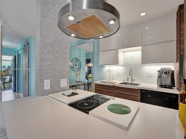 kitchen featuring white electric cooktop, white cabinetry, sink, and dishwasher