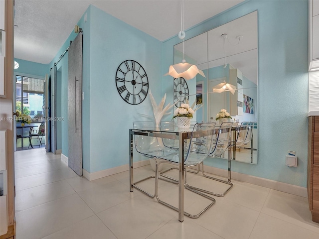 interior space with tile patterned floors and a textured ceiling