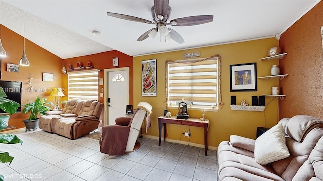 living room with light tile patterned floors, a textured ceiling, ceiling fan, and lofted ceiling