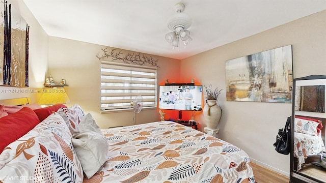 bedroom featuring hardwood / wood-style flooring