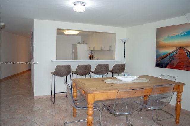 view of tiled dining room