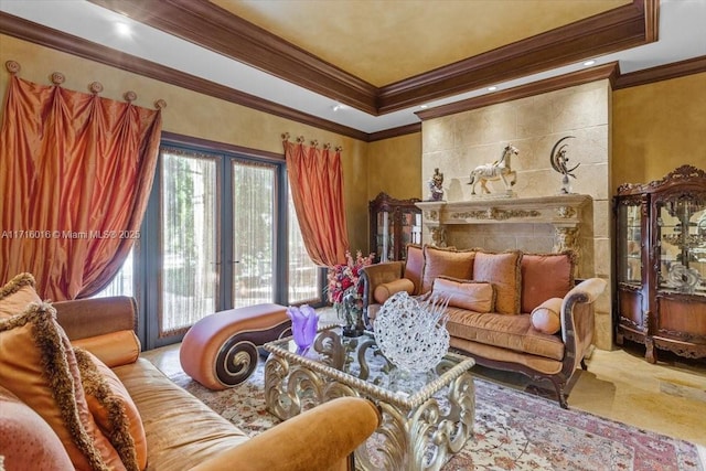 living area featuring a raised ceiling and crown molding