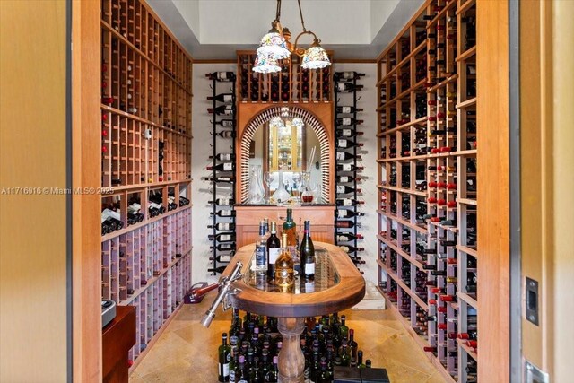 wine area with tile patterned flooring