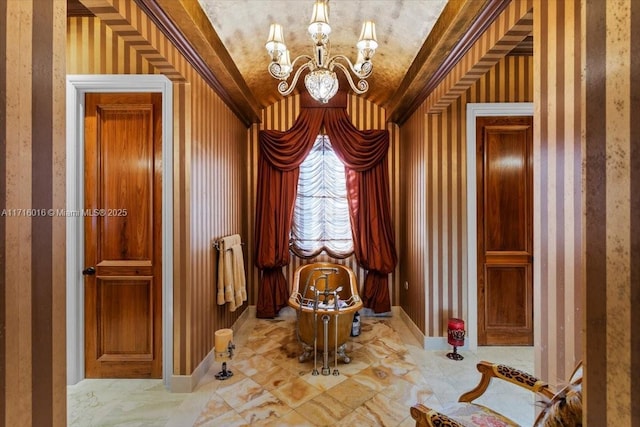 bathroom featuring lofted ceiling and a chandelier