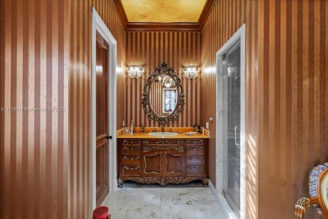 bathroom with vanity and crown molding