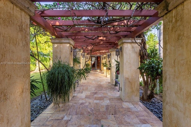 view of patio featuring a pergola