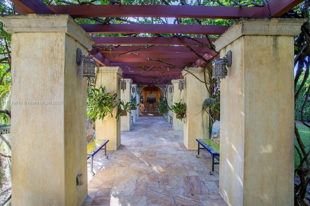 view of patio featuring a pergola