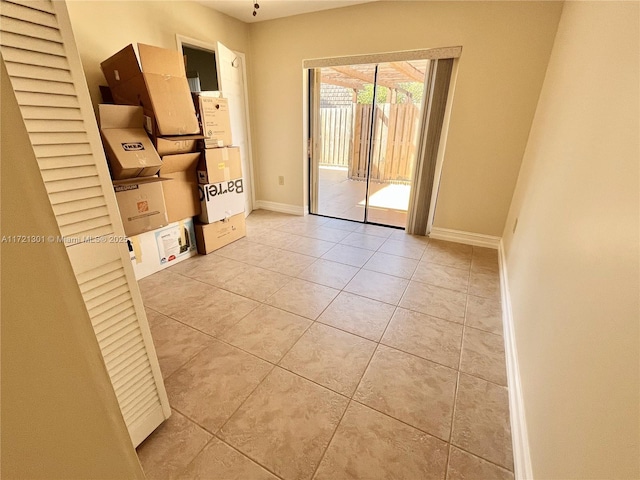 view of tiled spare room