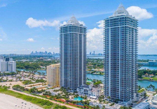 property's view of city featuring a water view