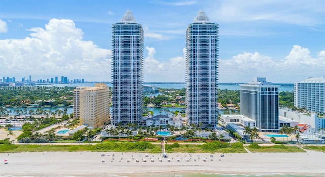 property's view of city with a beach view and a water view