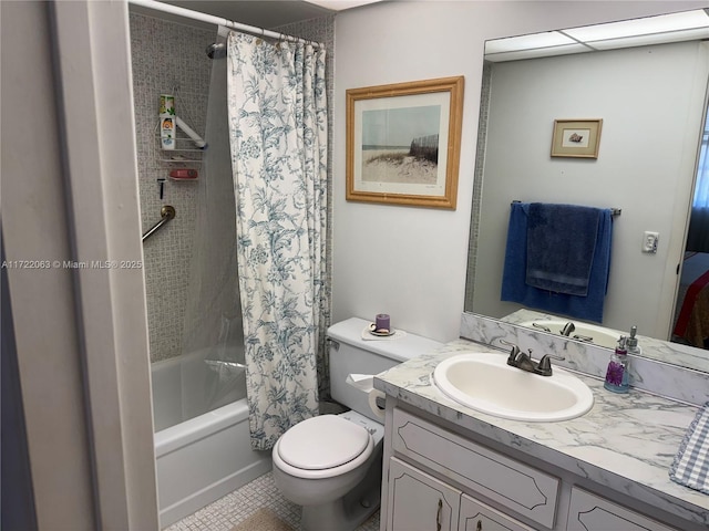 full bathroom featuring toilet, shower / bath combination with curtain, vanity, and tile patterned floors