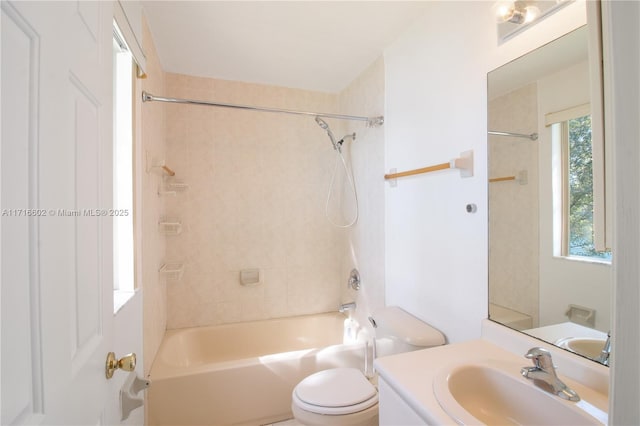 full bathroom featuring vanity, shower / tub combination, and toilet