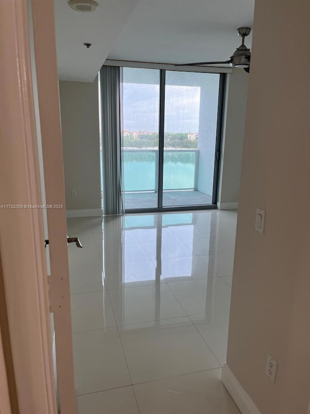 corridor featuring tile patterned flooring