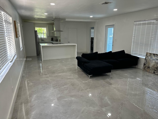 living room featuring sink