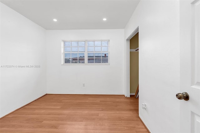 unfurnished bedroom with light hardwood / wood-style floors