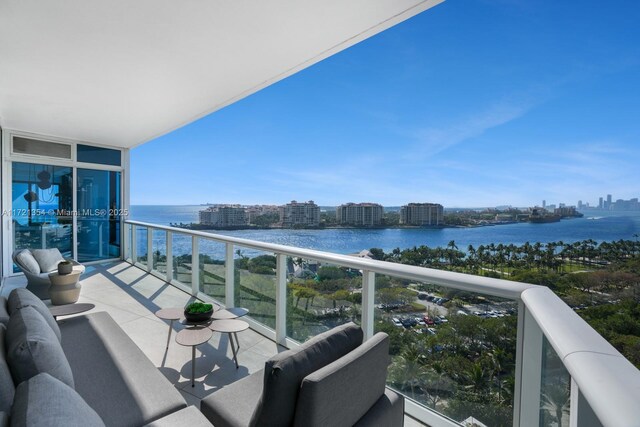 100 S Pointe Dr Unit 1201/1202, Miami Beach, FL 33139 - balcony with a water view and a city view
