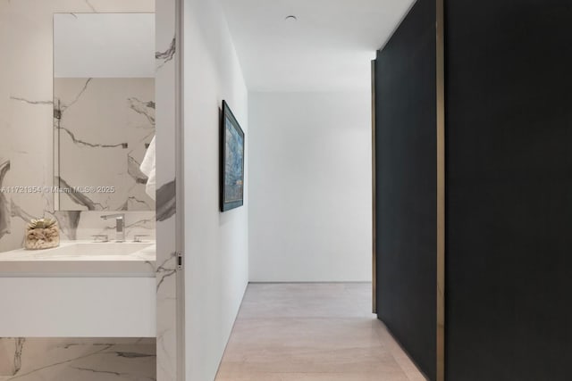 hallway with a sink