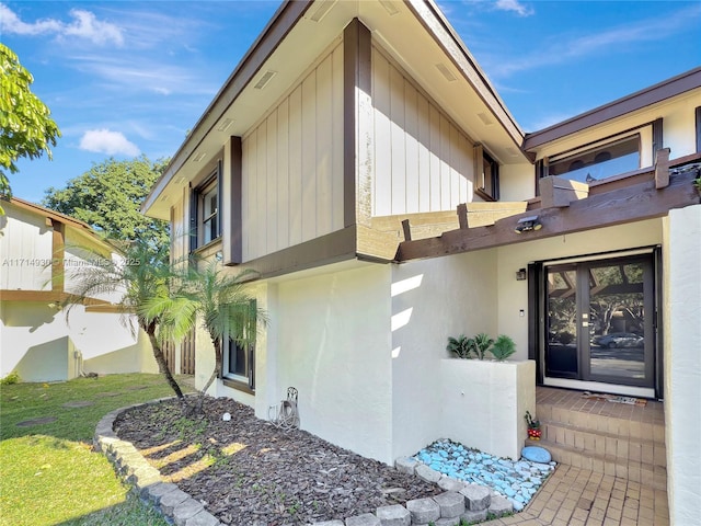 view of home's exterior featuring french doors