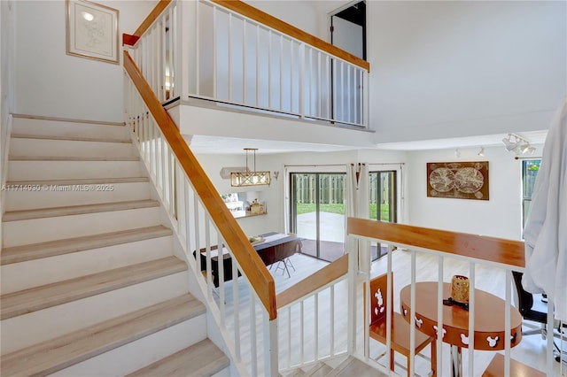 stairway with a high ceiling