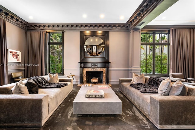 living room with ornamental molding