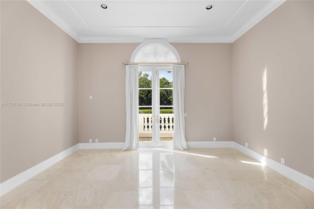 empty room with crown molding and french doors