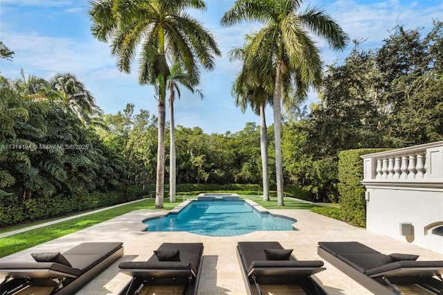 view of pool featuring a patio area