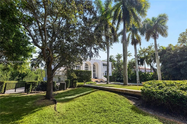 surrounding community featuring a lawn