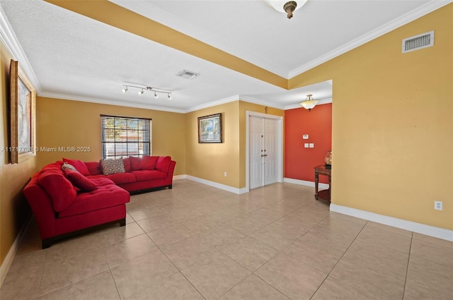 living room featuring light tile patterned flooring and ornamental molding