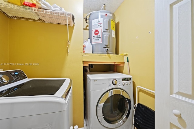 washroom with independent washer and dryer and water heater