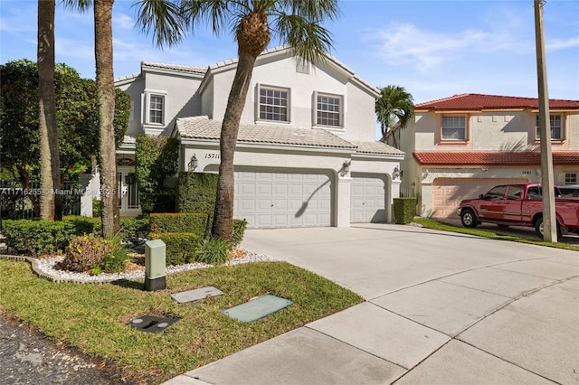 mediterranean / spanish-style home featuring a garage