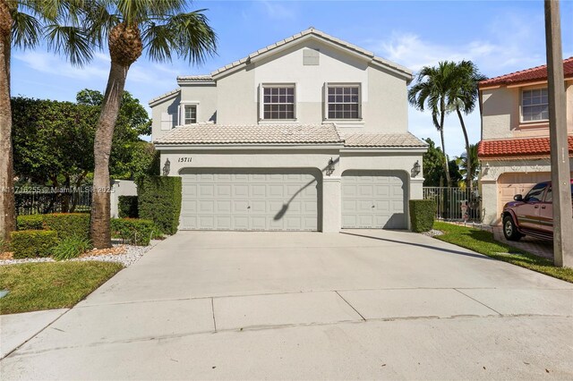 view of front of property featuring a garage