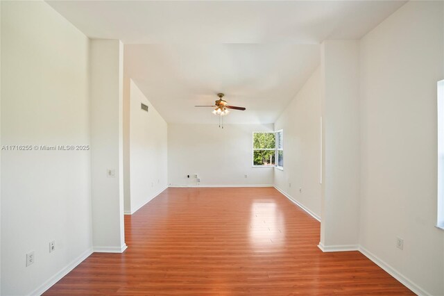 walk in closet featuring hardwood / wood-style flooring