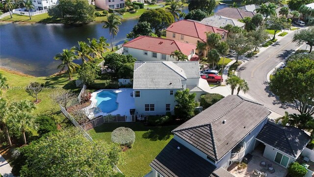 birds eye view of property featuring a water view