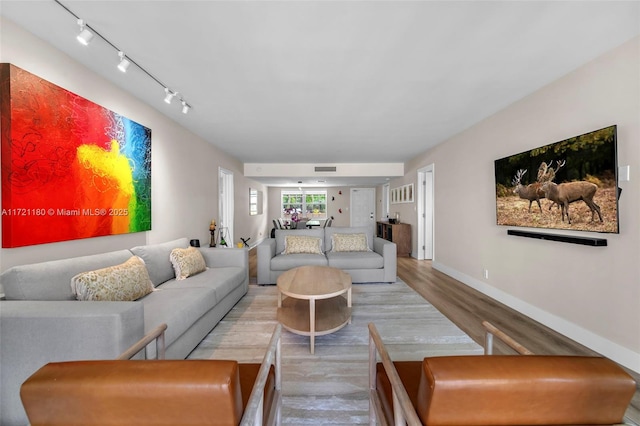 living room featuring wood-type flooring