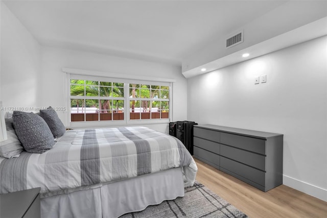 bedroom with light wood-type flooring