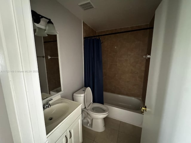 full bathroom with tile patterned flooring, vanity, shower / bath combination with curtain, and toilet