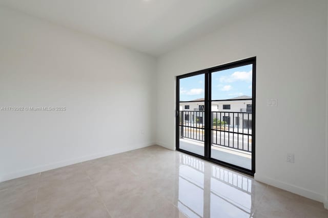 view of tiled empty room