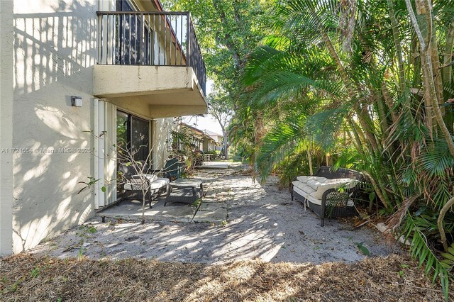 view of front of home featuring a garage and a front lawn