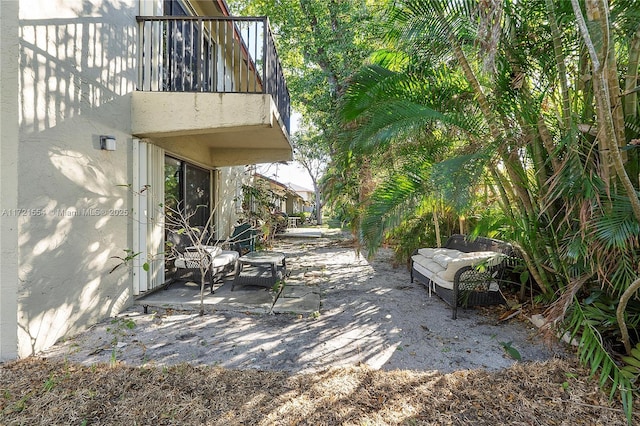 view of patio / terrace featuring a balcony